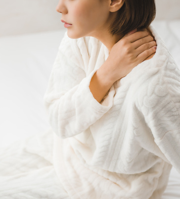 疲れを感じている女性