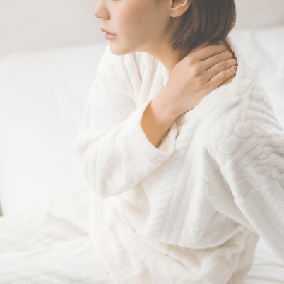 疲れを感じている女性